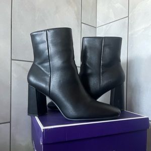 Black high top boots with heel